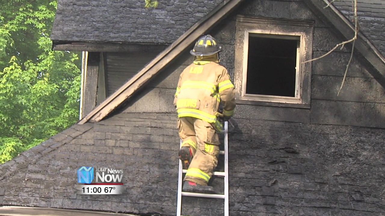 Duplex heavily damaged after grill catches porch on fire 1.jpg